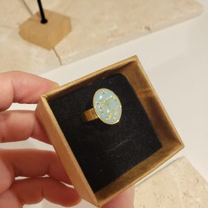 bague doré bleue, fleur