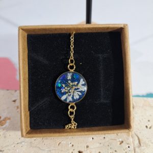 bracelet bleu fleur blanche