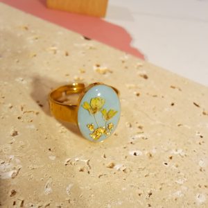 bague doré bleue fleur jaune